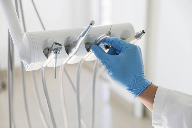 Professional Teeth Whitening technician working in East Massapequa, NY